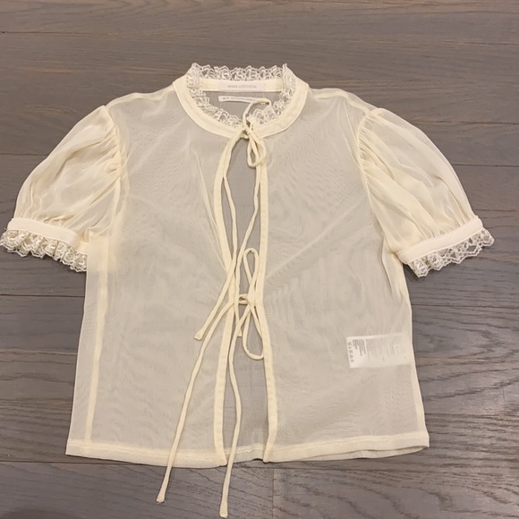 Urban Outfitters Tops - Urban outfitters sheer top *never worn*